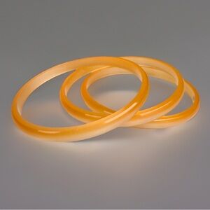 Set of Three Vintage Lucite Orange Bangle Bracelets